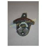 Wall mount Coca Cola opener