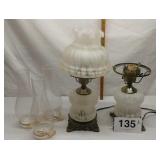 2 GLASS LAMPS 1 MISSING GLOBE, 3 CHIMNEYS