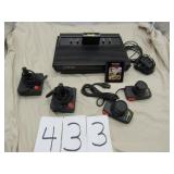 ATARI 2600 W/4 PADDLES & 2 GAMES