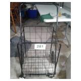 GROCERY CART...NEEDS NEW FRONT WHEEL 
FOLDS UP