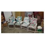 Four folding lawn chairs