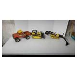 Three Tonka toys