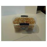 Tub of Topaz colored glass gems