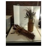 Miscellaneous floral pieces and wicker vase