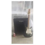 Behringer Amplifier and Cresent Guitar