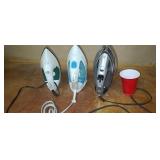 3 clothes irons.