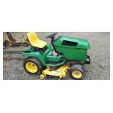 John Deere  320 riding lawn mower  ( bad engine)