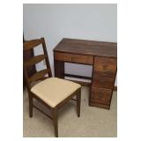 Knee hole desk with chair.