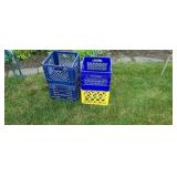 4  plastic milk crates.