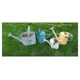 Lawn watering cans.