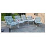 Set of lawn furniture one is a swivel rocker.