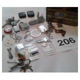 METAL FRUIT CAKE TIN OF MISC KEYS, KEYCHAINS, ETC