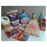 OLD CLOTHESPINS AND BAG, PARTIAL USED BOTTLES OF