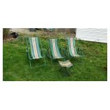 Antique folding wood lawn chairs.