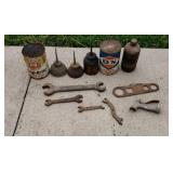 Old oil cans  Ford Wrench