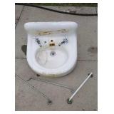 Cast iron bathroom sink with milk glass and brass