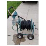 Garden hose on portable reel.