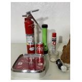 Fire extinguisher, flashlight, clock, candle,