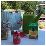 Yard decorations and watering can