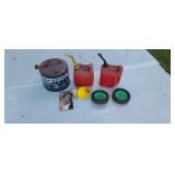 Gas cans lawnmower wheels funnels.