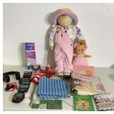 Dolls, hand held games, doilie and quilt books,