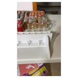 All different kinds of spices, jars, shelf