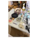 Bathroom items- makeup bags, cleaner, mirror,