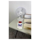 Trash cans, scale, towels, fan, shelf, plastic