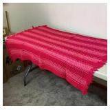 Pillow cases and pink crocheted Afghan