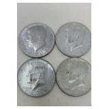 4 Kennedy half dollars