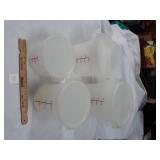 4 PLASTIC MEASURING CONTAINERS W/LIDS