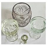 2 goblets, shot glass & ? Candle holder
No