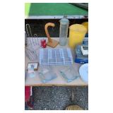 Ash trays, blood pressure cuff, Tupperware