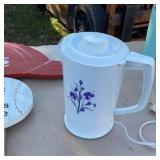 Cardinal sign, light, electric coffee maker