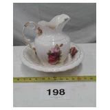 CREAM AND FLORAL PITCHER AND BOWL
