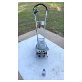 Brand new out of box, electric Earthwise,