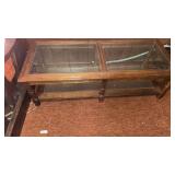Glass top coffee table, 51x21x15 inches