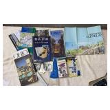 Atlas, maps, ice scrapers, tire gage