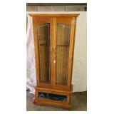 Oak gun cabinet have key.