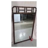 Wall mirror with bamboo frame.