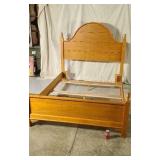 Knotty Pine bed queen size.