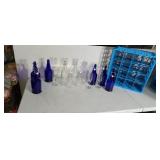 Resealable clear and blue bottles and plastic