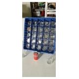 24 glass in plastic tray.