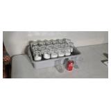 36. Ikea clear glasses in plastic bus tray.