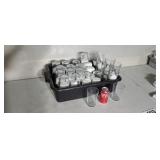 47  Ikea clear glasses in plastic bus tray.