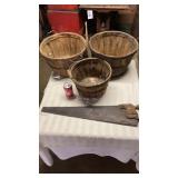 Vintage saw, wooden baskets