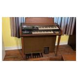 Wurlitzer Electric Organ, bench , music books