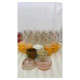 Pink depression bowls, glasses, coffee cups