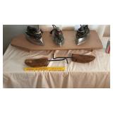 Ironing board, shoe stretchers, 3 vintage irons