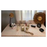 Clocks, phones , desk lamp